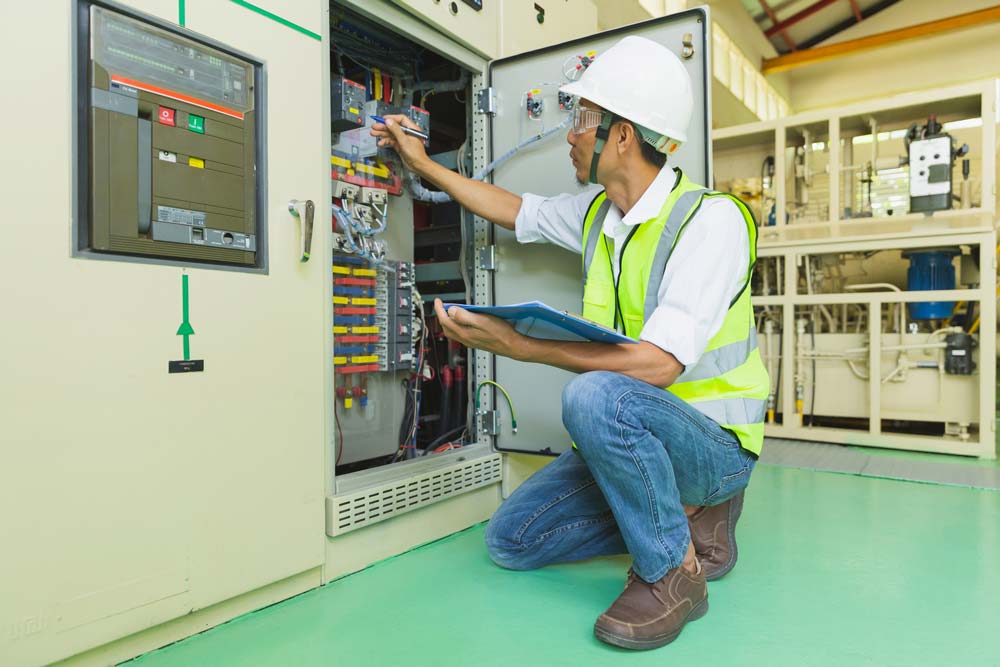 A worker checking the generator's transfer swtiches at Blairstown, NJ